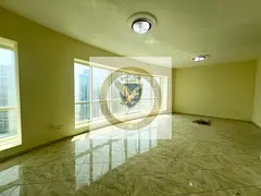 3-bedroom apartment with living room in Al Majaz 3, featuring free AC, free parking, gym, pool, and