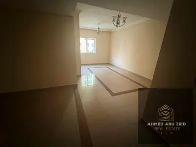 3BR apartment in Al Taawun with master bedroom, maid room, 3 bathrooms, closed kitchen, balcony, parking, and easy access to Dubai.