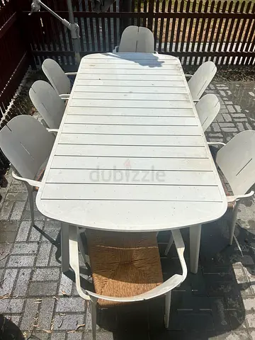 Outdoor garden dining table with 8 matching chairs - white