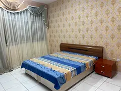 Fully furnished family room with balcony available in Ajman