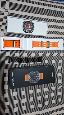 Samsung Galaxy Watch ultra with 2 original Samsung strap and one chain with expandable strap.