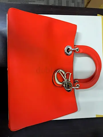 Vibrant Orange womens handbag with gold hardware - Excellent Hardware