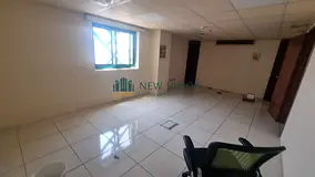 Commercial Office for Rent in Al Qasimia in a clean building with free central AC provided by the la