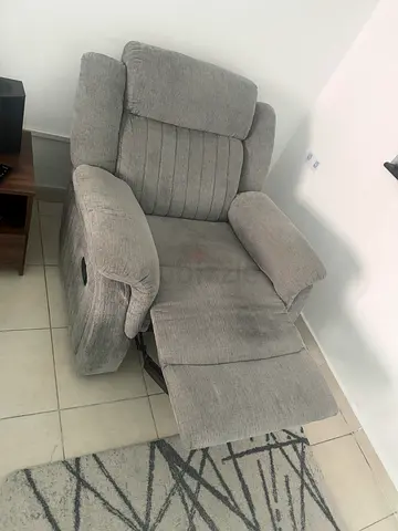 Comfortable grey fabric recliner chair - good condition