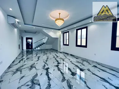 Annual corner villa for rent in Al Yasmeen, Ajman. Features 5 bedrooms, living room, majlis, maid’s room, and 8 bathrooms. Land area: 3,400 sq. ft., b