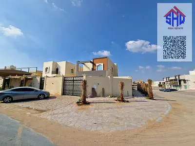 Corner villa with water and electricity for sale and AC freehold for all nationalities