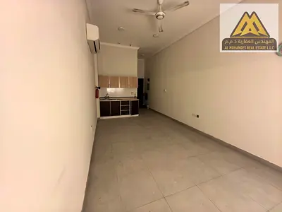A great opportunity to rent a spacious studio in a quiet and lively area of Al Muwaihat 1, featurin