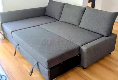 Grey L-shaped Sofa Bed with Storage - Good Condition