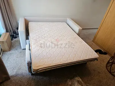 Italian comodo two seater sofa bed with mattress