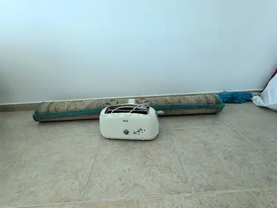 Toaster, carpet, cutlery. FREE