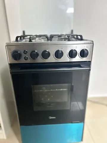 Midea Stainless Steel Gas Cooker with Oven - 4 Burners