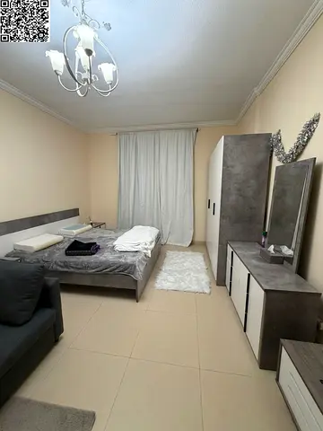 For rent in Ajman, Al Yasmeen Towers: Furnished studio, all-inclusive (utilities included), with a