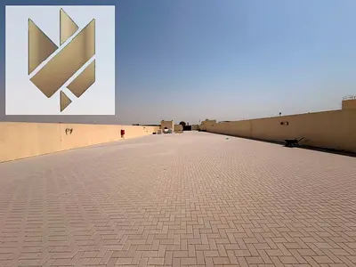 35 kW Power Supply | 20,000 Sq. Ft. Open Yard | Main Road Location | Prime Location in Al Saja’a | Wide Entrance | Suitable for Any Business Activity