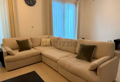 Home Center swin feather filled sofa