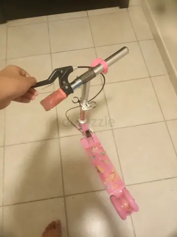 Pink foldable kids scooter with handbrake - good condition