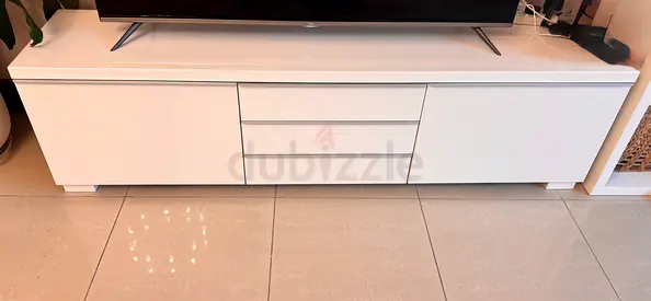 White high gloss TV cabinet -white high gloss center table- navy blue sofa L shape