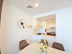 High-Floor 1BR | City & Pool Views | Balcony — 3