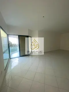 Three-bedroom apartment with balcony in Al Majaz 1, direct lake view, first row, free air conditioni