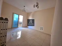 For annual rent in Ajman, Al Rawda 1 area, near Kenz Mall, two bedrooms and a living room