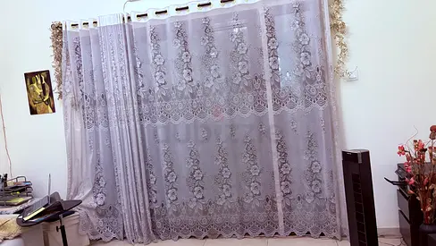 White sheer net curtains