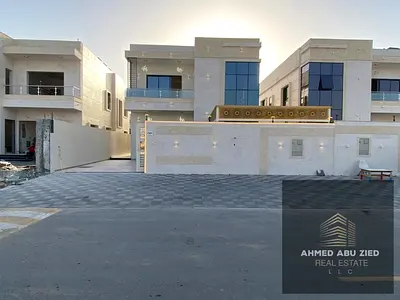 For rent in Al Helio 2, Ajman: A villa featuring 5 bedrooms, a majlis, a living area, a spacious kitchen, and a maid's room.