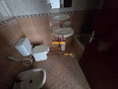 2-bedroom apartment for rent in Al Qasimia–Abu Shagara on Al Wahda Street. Spacious, 2 bathrooms, clean building, rent AED 43,000, 4 or 6 cheques.