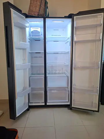 Samsung side by side same like a new condition refrigerator