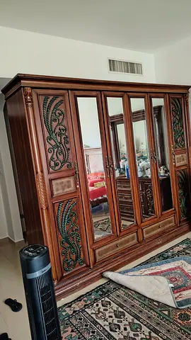 Classic Dark Wood 6-Door Wardrobe with Mirrors and Ornate Carvings