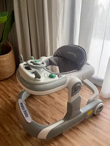 Happy Baby adjustable baby walker with toys - like new condition