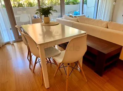 White Dining table with 4 chairs and a bench for sale