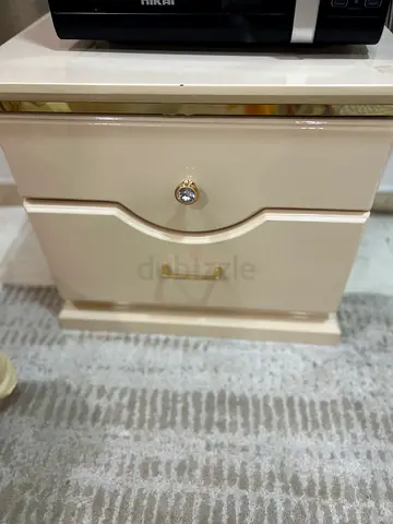 Cream bedside nightstand with two drawers — good condition