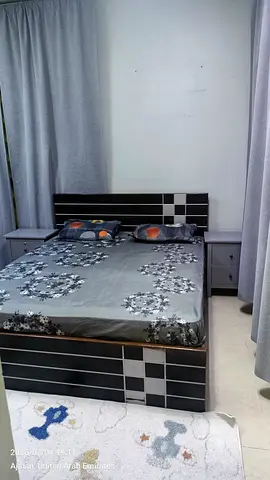 Double bed frame with two bedside cabinets - good condition and with a good mattress.