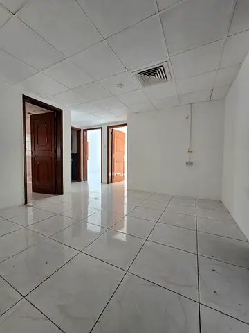 Annual rent in Al Mamzar 2, Sharjah: Spacious 2-bedroom apartment with central AC, prime location, 1 month free. AED 40,000/year, 4 or 6 payments.