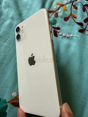 White iPhone excellent condition with MagSafe case personal used UAE version
