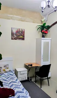 Spacious partition for working lady in Garhoud.