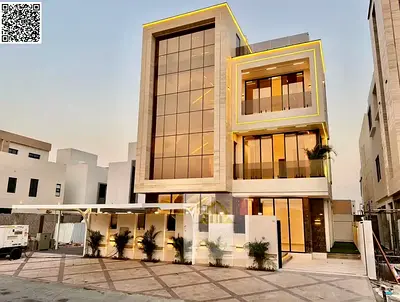 A luxurious villa at an exceptional, all-inclusive price, featuring a swimming pool and an elevator, situated in a strategic location close to Dubai a
