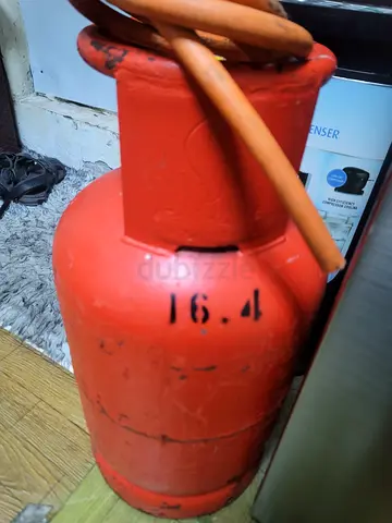 Orange LPG Gas Cylinder for Kitchen and Cooking Use with regulater and full gass