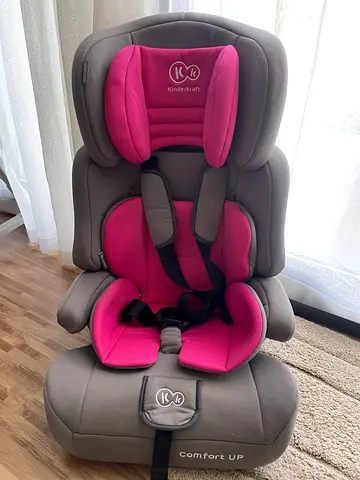 Pink and grey convertible child car seat (used) - no accidents/no damage history