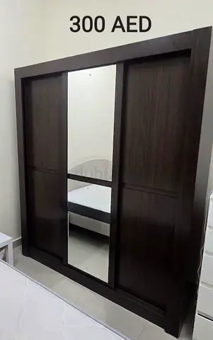 Dark wood sliding wardrobe with mirror - good condition