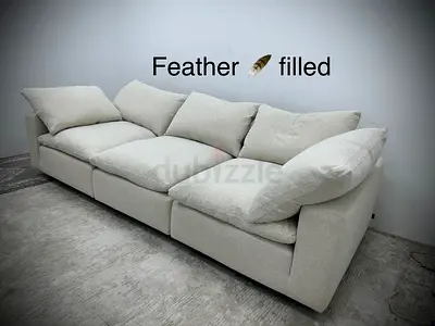 Looks great condition feather 🪶 filled sofa