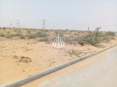 أرض استثمارية تجاري سكني على شارع الشيخ محمد بن زايد