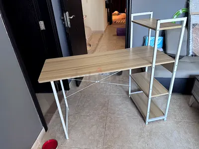 Light wood and white metal desk and 3-tier shelving unit