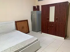 Room available for family- Sharing room Muwailah