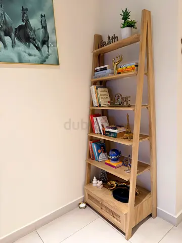 Canovia cane ladder bookshelf with one drawer - light wood finish