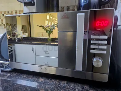 Silver Countertop Microwave Oven with Digital Display