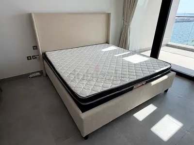 Beige fabric double bed frame with mattress - good condition