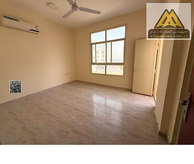 For annual rent in Al Alia, Ajman: 1-bedroom apartment with hall, 2 bathrooms, balcony, split AC, A