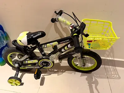 Kids 14 Thunderbird Super Bike with Training Wheels and Front Basket - Good Condition
