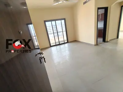 2 bedroom hall apartment for annual rent in Ajman Al Jurf prime location close to services with bal