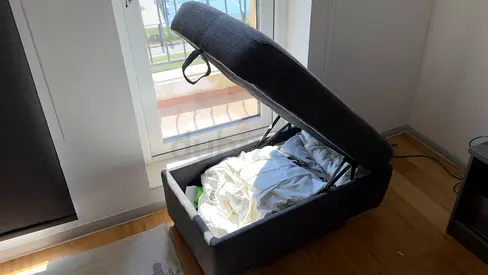 Grey fabric storage ottoman/bench with lift-up seat - good condition